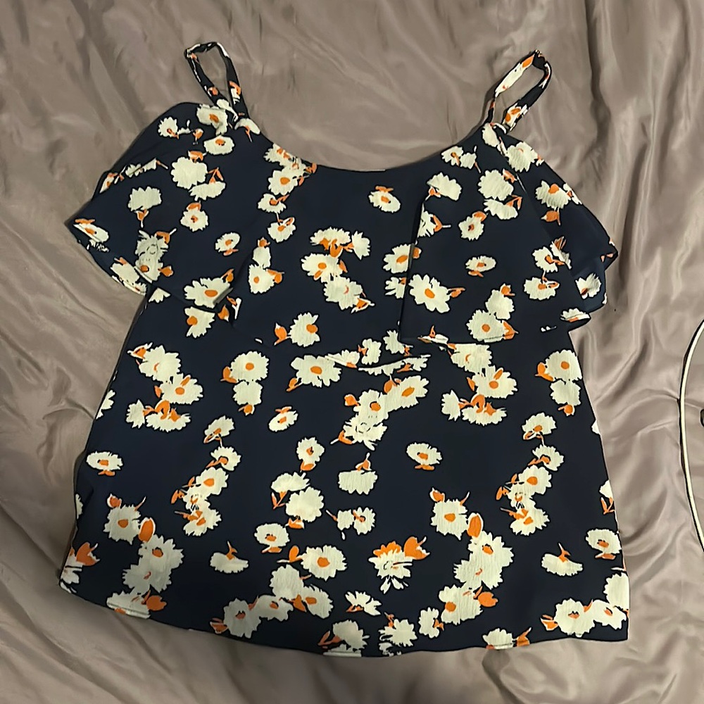 A flower top with spaghetti straps
